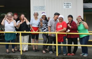 Photo of staff and volunteers making silly animal poses