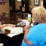 Picture of 2 ladies and Lani at Maui Peer Support Group meeting