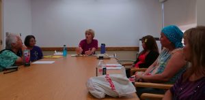 Photo of Dr. Farnham speaking to group