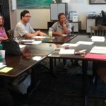 Photo of participants seated around table for Maui Hawaii Fi-Do training