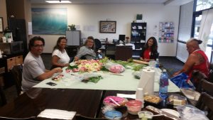 Photo of Maui Peer Support Group making lei