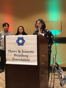 Photo of Val speaking at Weinberg Foundation Luncheon