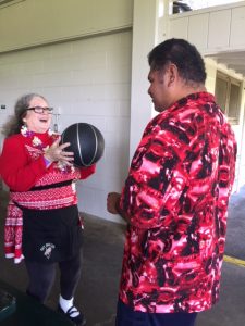 Lopeti receiving basketball from Emily