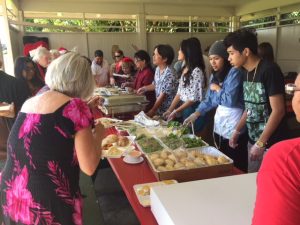 Guests getting their food