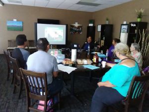 Photo of Maui Support Group members listening to guest speaker