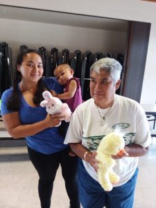 Photo of participants with stuffed animal donations