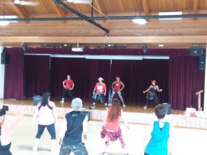 Photo of ZumbaJam instructors leading group in Zumba