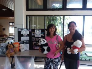 Photo of participants dropping off stuffed animals