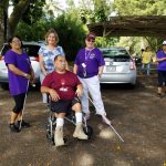 Photo of Lani, Karin, Sam, and consumer at Hilo White Cane Day