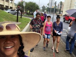 Photo of Lani selfie with other participants in the back