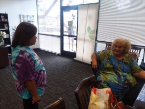 Photo of two ladies talking