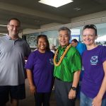 Photo of Brian, Lani, and Kathleen with Governor Ige