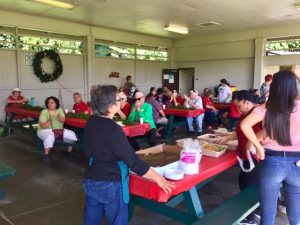 Photo of crowd getting ready to eat