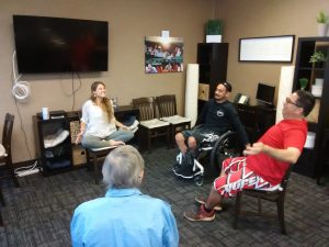 Photo of group practicing smile pose