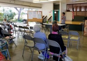 Photo of Tom speaking to the group