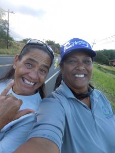 Photo of Julie and woman at charity walk