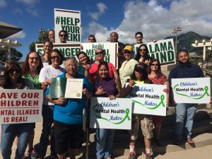 Photo of sign waving for Mental Health Awareness Month